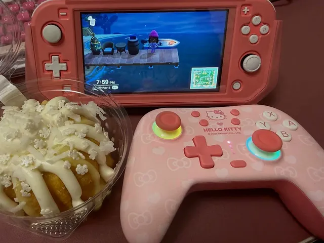 A pink Switch, a Hello Kitty controller and a coconut dessert